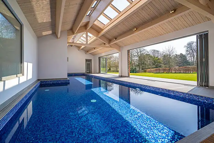 inside view of a barn style indoor pool 