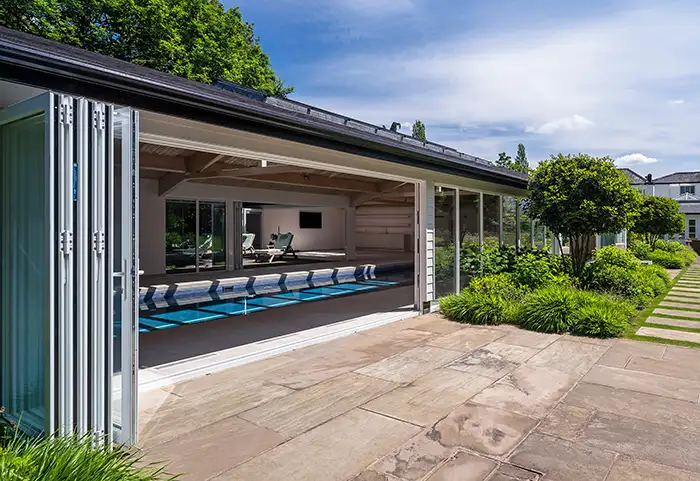 How moving floor pools work External view of a pool house